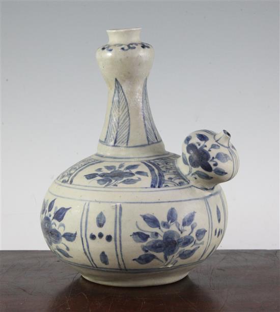 An Annamese blue and white porcelain kendi, 15th century, 23cm, sea-etched glaze